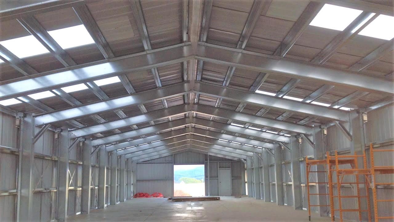 Interior view of a gable frame within a cold-formed steel building by Silverline Structures, showcasing the precision engineering and construction
