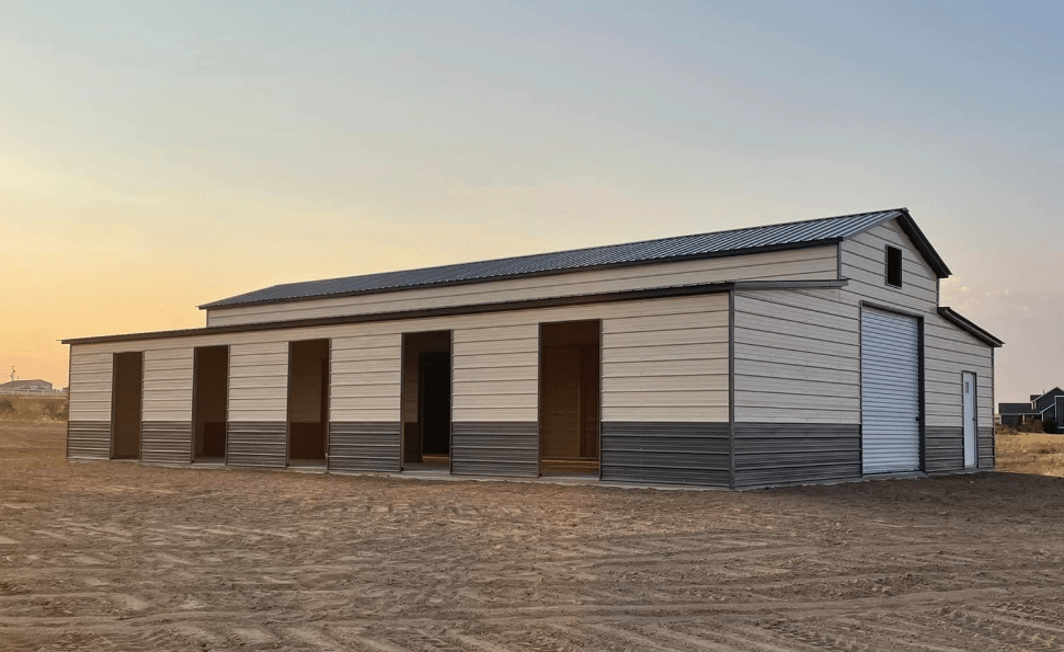 A metal horse barn by Silverline Structures, featuring a durable steel frame, high roof, and the cost comparison chart against traditional construction methods.